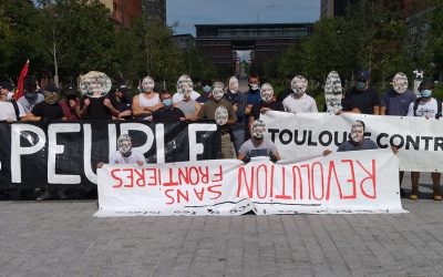Toulouse 11-09-21 : drapeaux occitans et français contre drapeau rouge